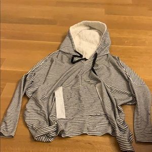 Sweater with shearling-lined hood